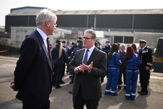 Sir Kiere talks to Bae Systems Charles Woodburn after dealing with the royal naval submarines from the HMS Agamemnon nuclear submarine